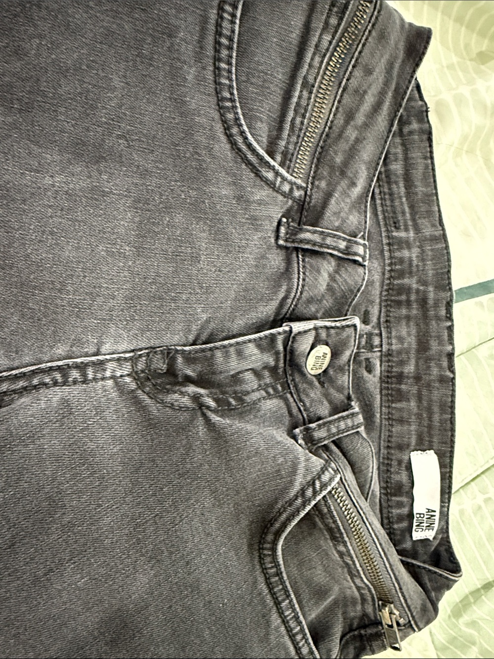 ANNIE BING black wash Denim Jeans w/ zippers on waist and ankles
